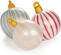 Three large white ornament inflatables with thin red, green and gold stripes and gold caps