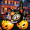 Black cat with a sugar-skull face pattern over two glowing jack-o'-lanterns in a Halloween yard